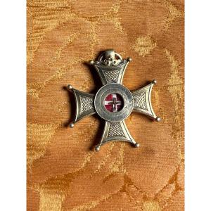 Stauroteca in argento dorato cesellata a croce greca con la reliquia della S.Croce