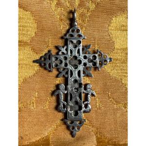 Croce in argento cesellato