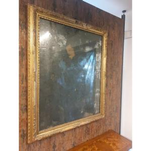 Elegante specchiera Veneziana del XVIII Secolo in legno intagliato e dorato