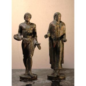 Ceramica Minghetti | Copia in ceramica a patina bronzea di una coppia di figure etrusche .