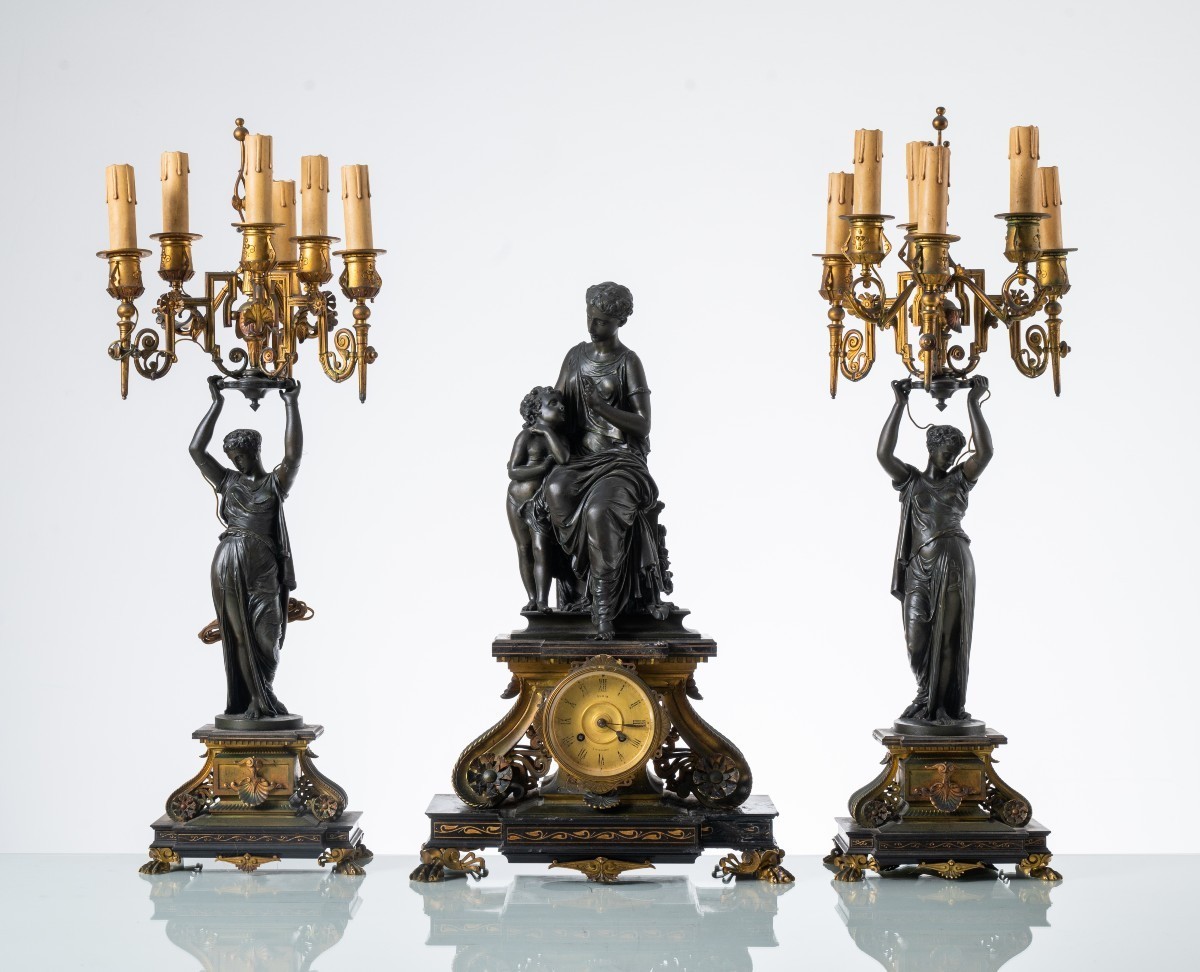 Trittico orologio in bronzo patinato 