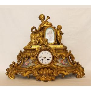 Orologio dorato con placche Sevres, Francia, XIX sec