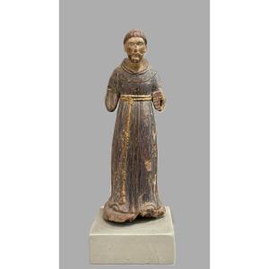 Scultura lignea policroma, raffigurante figura religiosa.