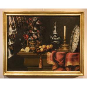 Antonio Tibaldi (Roma 1635 - 1675), Natura morta con vaso di fiori, frutta ed oggetti preziosi