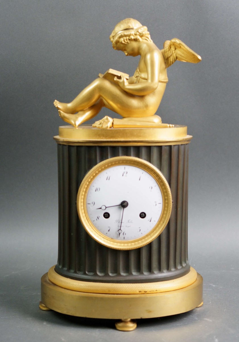 Orologio Impero in Bronzo Dorato "Amore che legge" circa 1810
