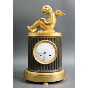 Orologio Impero in Bronzo Dorato "Amore che legge" circa 1810