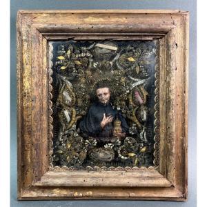 Cornice Reliquirio con Sei Reliquie e San Luigi Gonzaga in Cera, XVIII secolo 