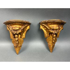 Coppia di Mensole Legno Dorato a Mascheroni Grotteschi XIX