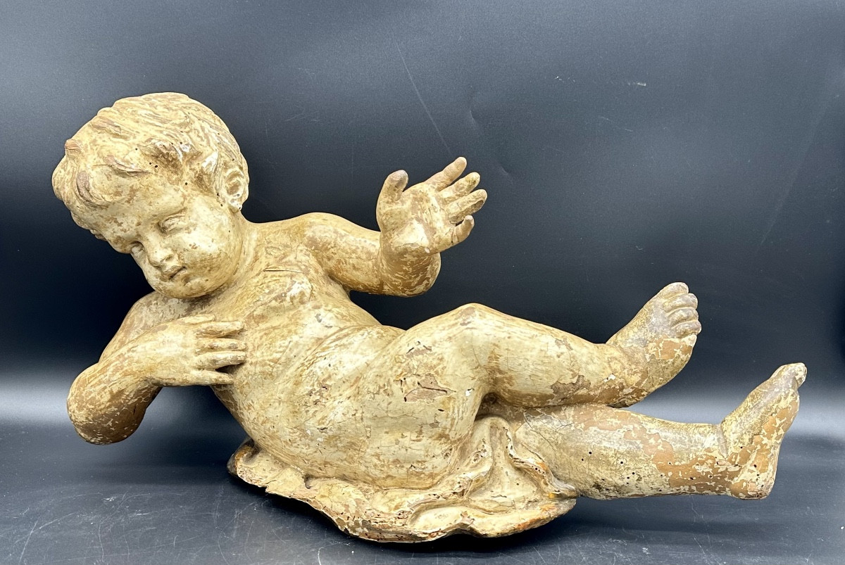 Scultura laccata “Angelo giacente” - Inizio del XVIII sec. 