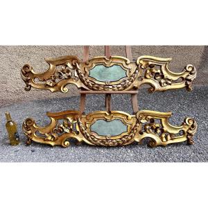 Coppia di grandi fregi, sovraporte, cimase in legno dorato - XIX sec. 
