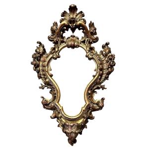 Cornice barocca in legno dorato con acquasantiera - Luigi Filippo. 