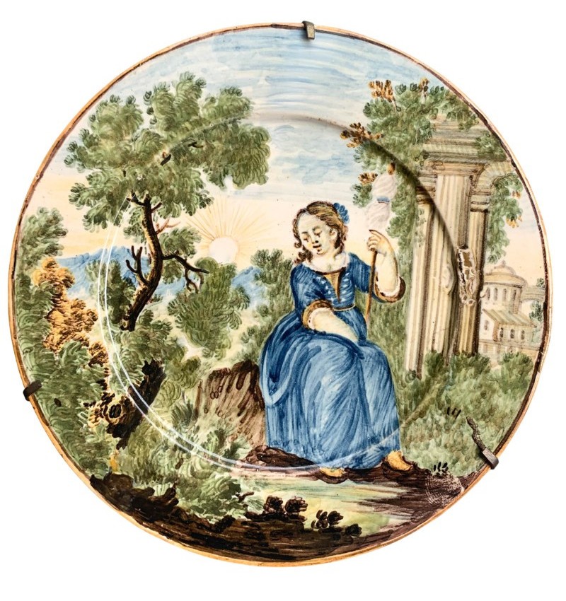 Nicola Cappelletti. Castelli. Maiolica con giovane donna con fuso e rovine, metà XVIII s.