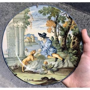 Maiolica di Castelli d’Abruzzo, piattello con giovane uomo col cappello e cane. Metà XVIII sec