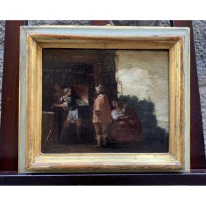 Gentiluomo con spada nella fucina di un fabbro. Italia, prima metà del XVII secolo 