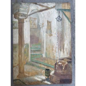 Henry d’Estienne (1872-1949) – Luce in un cortile nordafricano con pozzo