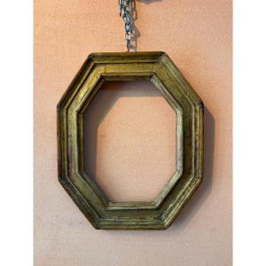 Ma Cornice Ottagonale in legno Dorato.