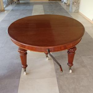 TAVOLO INGLESE ALLUNGABILE IN MOGANO DELLA SECONDA META' DEL XIX SECOLO.