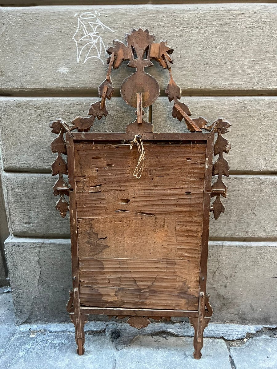 Specchiera in legno intagliato e dorato-photo-1