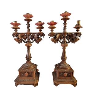 Bellissima coppia di candelabri in legno intagliato 