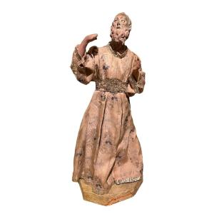 Statua in terracotta di figura maschile