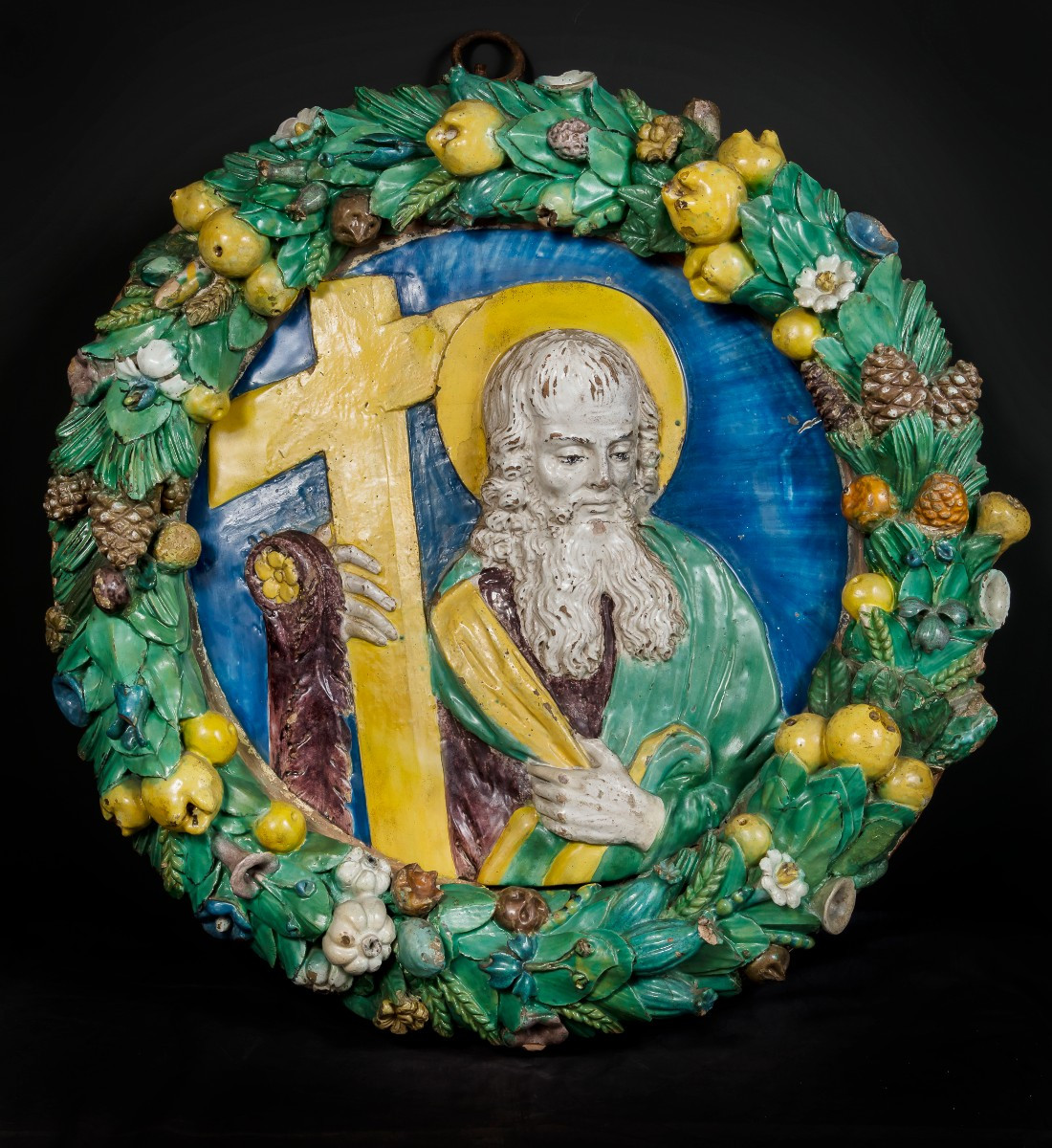 Santi Buglioni, Tondo in terracotta affigurante  Sant'Andrea entro una corona di frutti e fiori