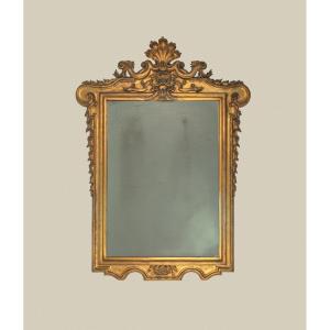 Specchiera in legno scolpito e dorato  XIX secolo