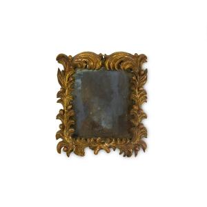 Cornice montata a specchiera in legno scolpito e dorato, XVIII secolo