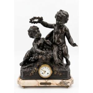 Orologio da tavolo in antimonio, XX secolo, Francia