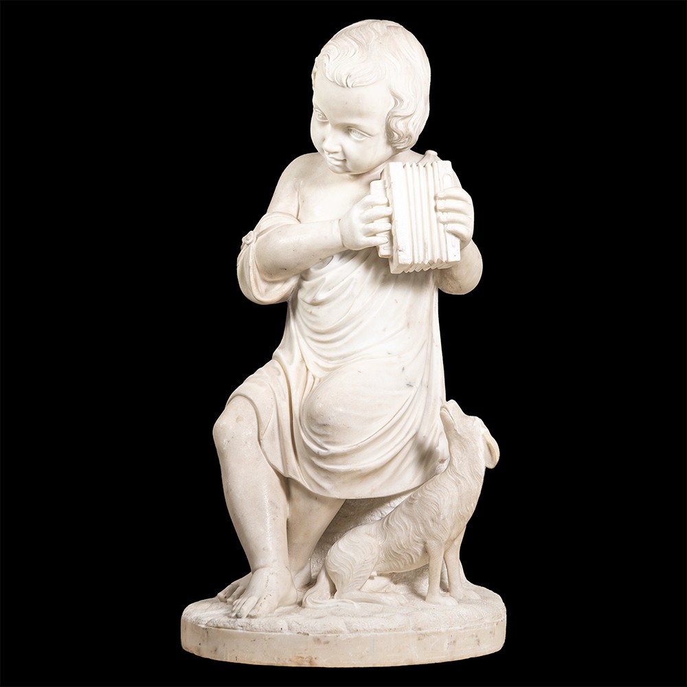Scultura in marmo raffigurante fanciullo con cane