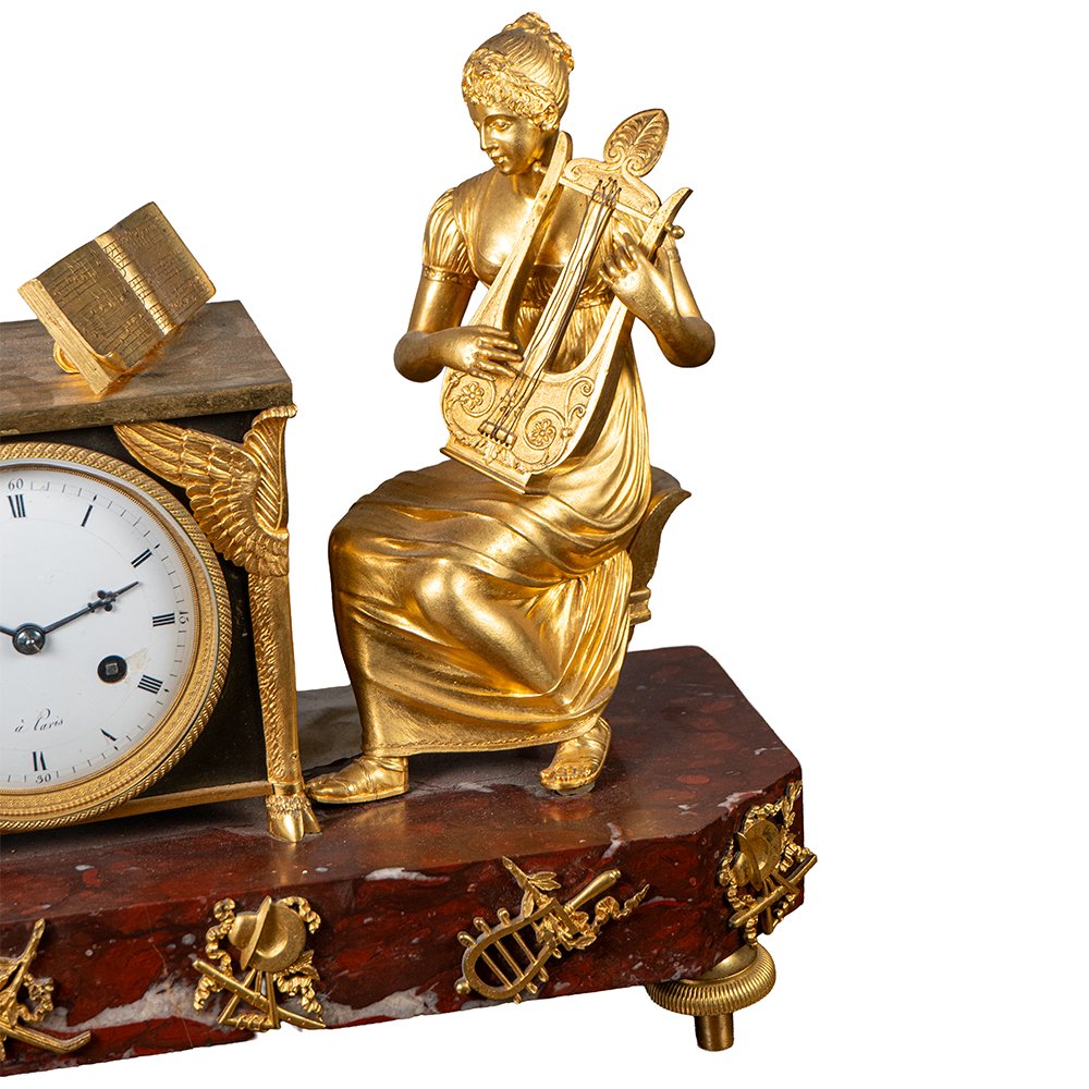 Orologio raffigurante donna con strumento musicale-photo-1