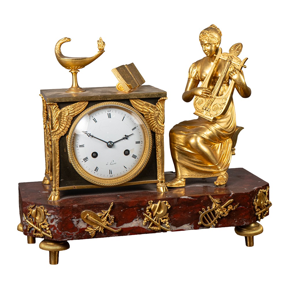 Orologio raffigurante donna con strumento musicale