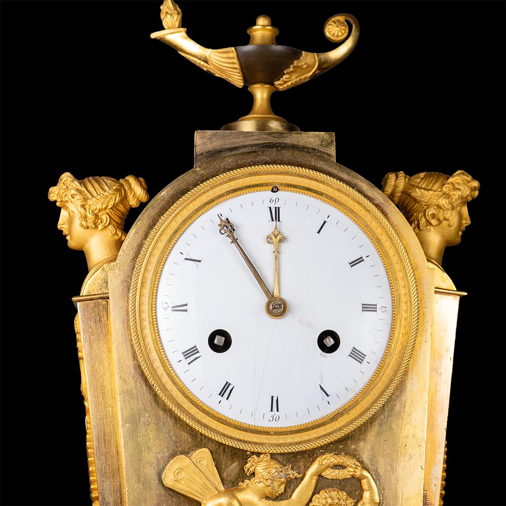 Orologio in bronzo cesellato e dorato-photo-1