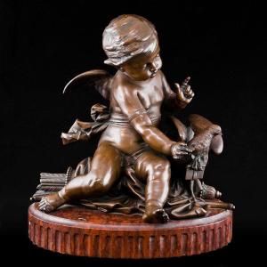 Scultura raffigurante Cupido che gioca con un colombo – Victor Paillard