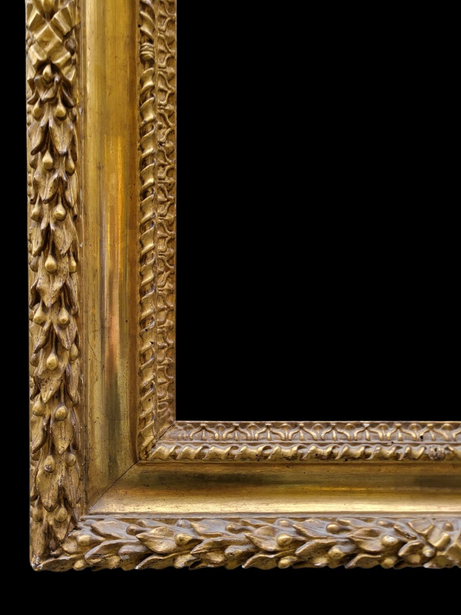 Cornice in legno intagliato e dorato-photo-3