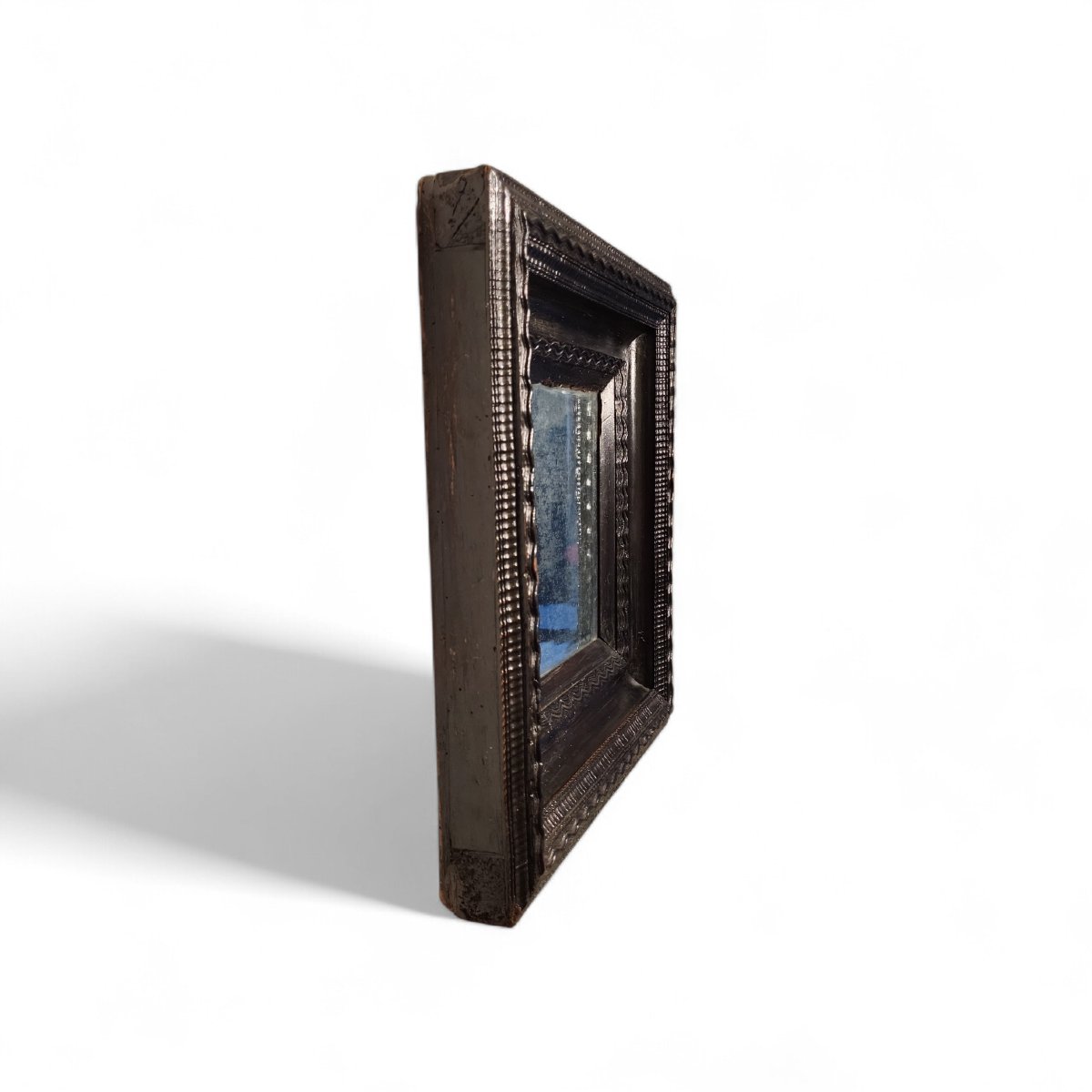 Cornice guilloché in legno ebanizzato. Lombardia, XVII secolo.-photo-2