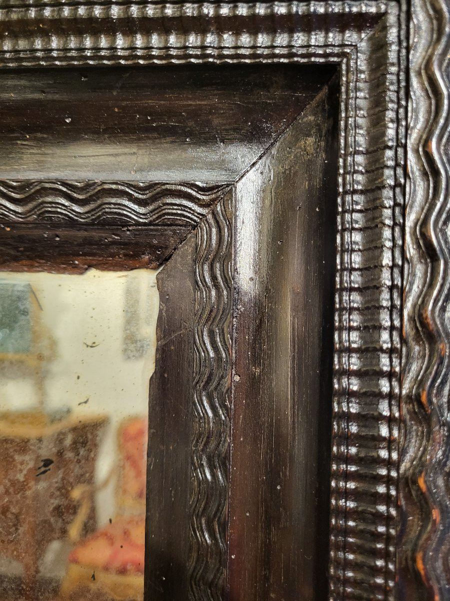 Cornice guilloché in legno ebanizzato. Lombardia, XVII secolo.-photo-3