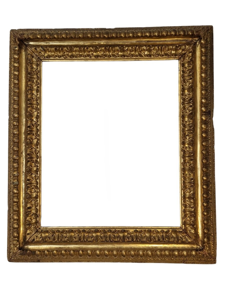 Cornice intagliata e dorata ad oro zecchino. Bologna, XVII secolo.