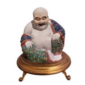 Statua in porcellana cinese raffigurante Buddha sorridente