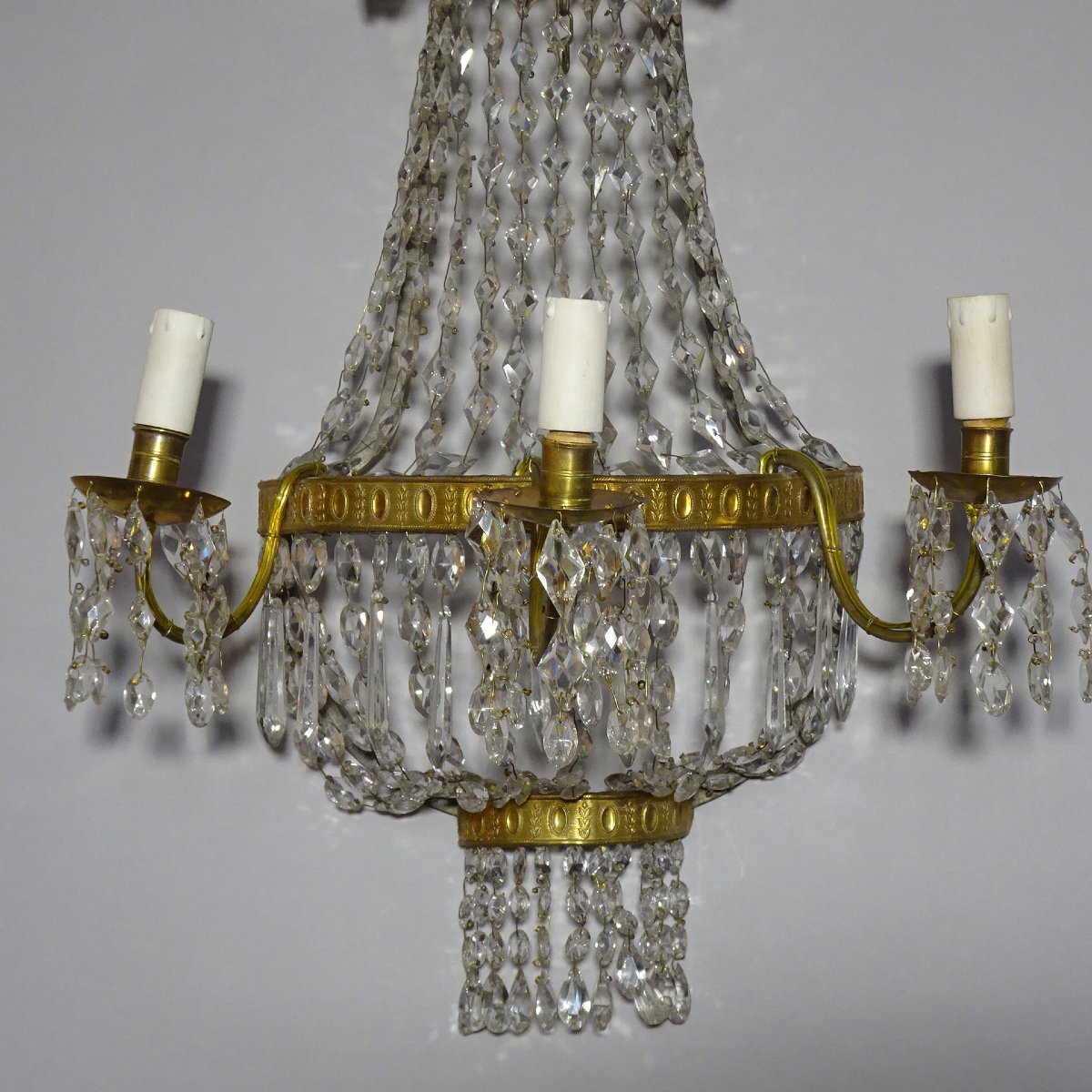 Coppia di applique Impero in metallo dorato e cristalli -photo-1