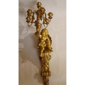 Putto porta candele in legno dorato inizio XIX secolo