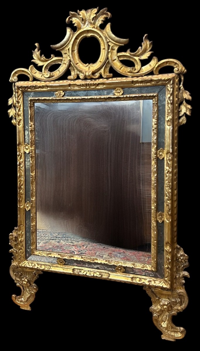 Specchiera in legno scolpito e dorato a mecca
