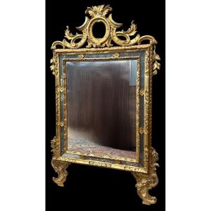 Specchiera in legno scolpito e dorato a mecca