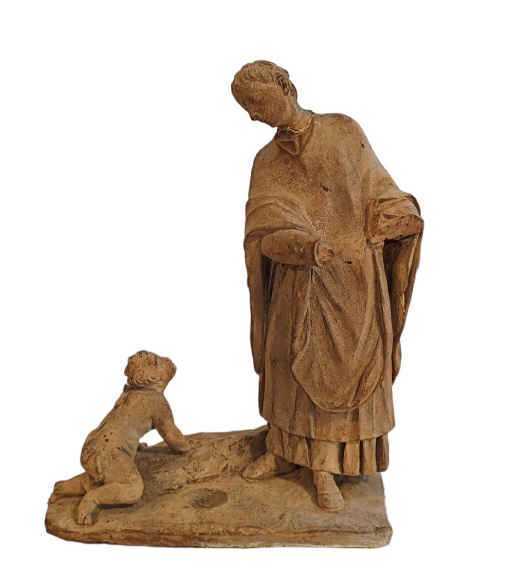 Scultura in terracotta raffigurante uomo con bambino. Italia, inizio XVIII secolo.