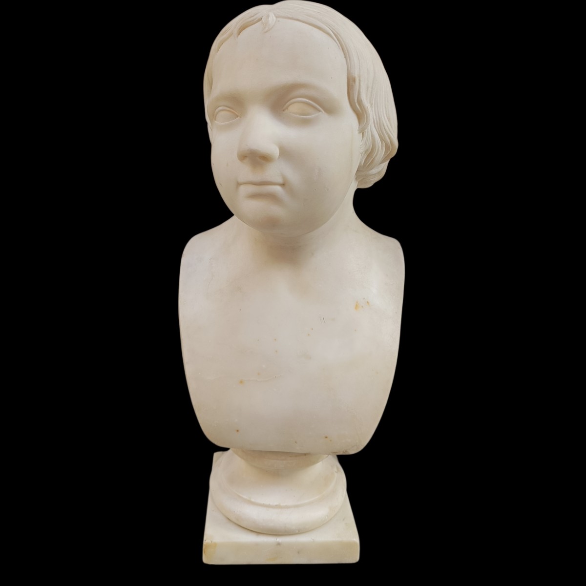 Busto in marmo neoclassico raffigurante fanciullo.Italia,1820 circa.