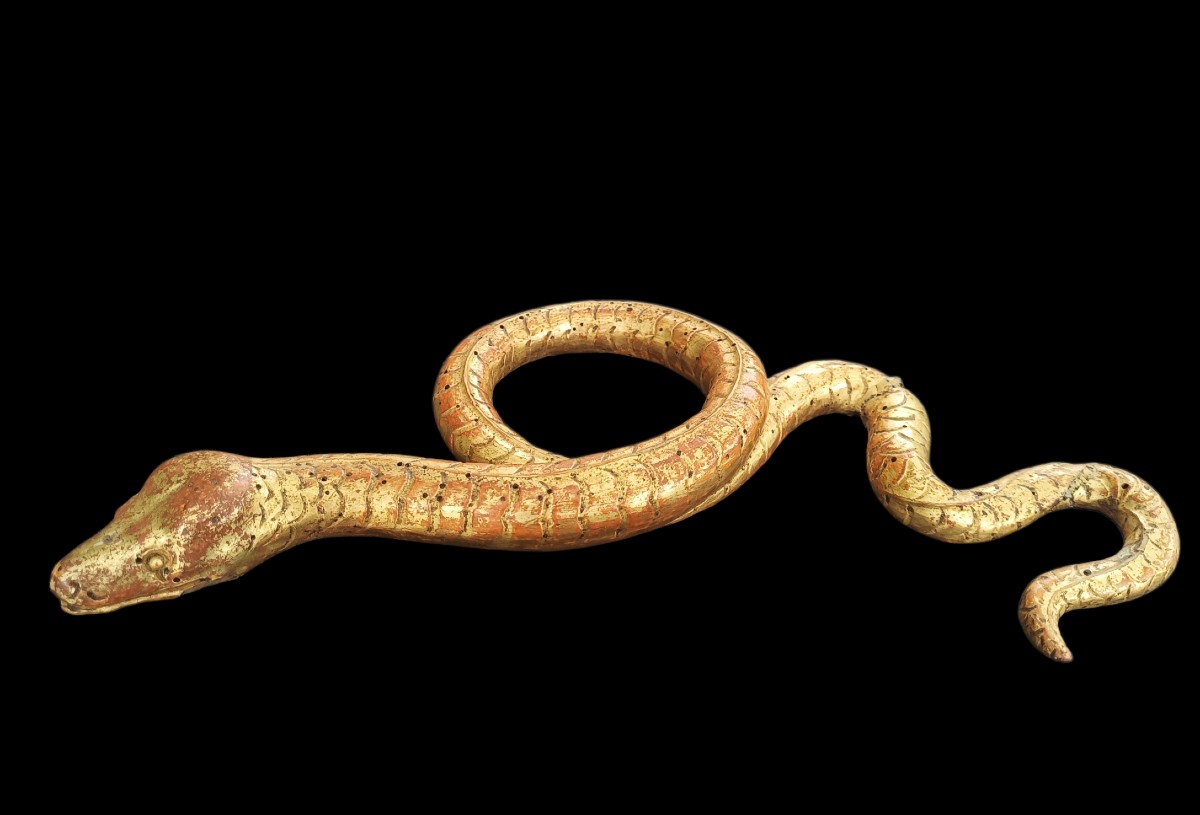 Scultura raffigurante serpente in legno dorato.Italia,fine XVIII secolo.