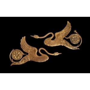 Coppia di elementi in bronzo dorato.XIX secolo.