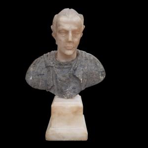 Busto di imperatore romano in marmo grigio e alabastro.Roma,inizio XIX secolo.