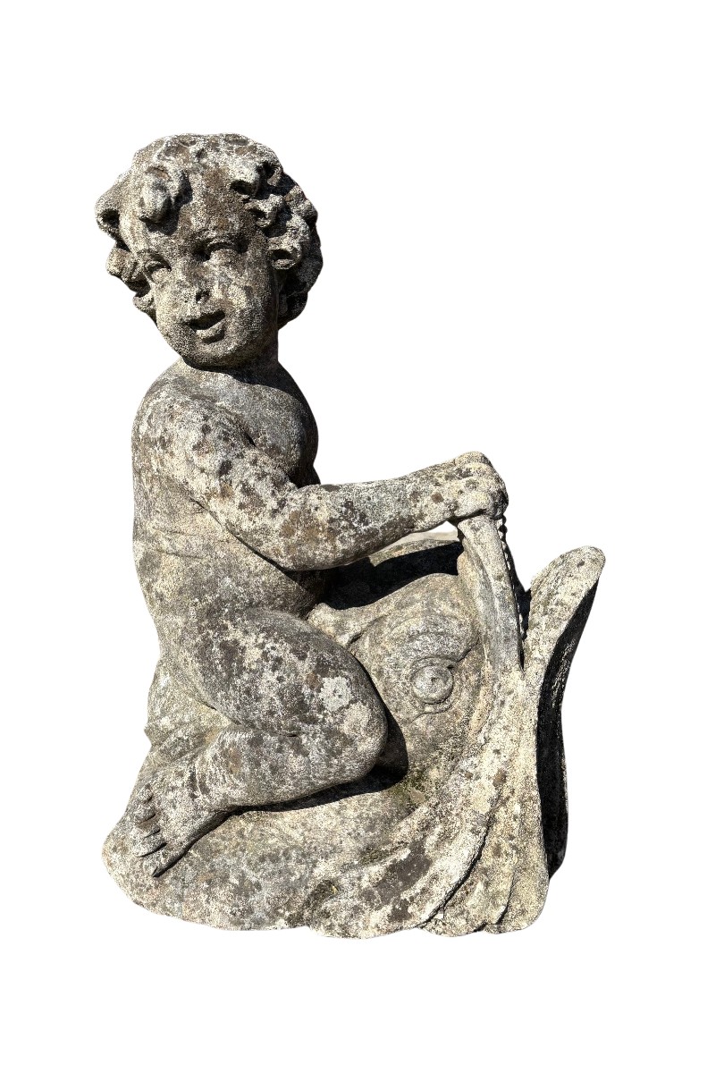 Gruppo in pietra per fontana con fanciullo e delfino