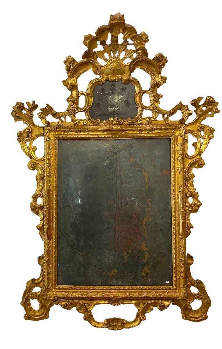 Specchiera veneziana in legno intagliato e dorato ( minimi restauri ai fregi laterali )