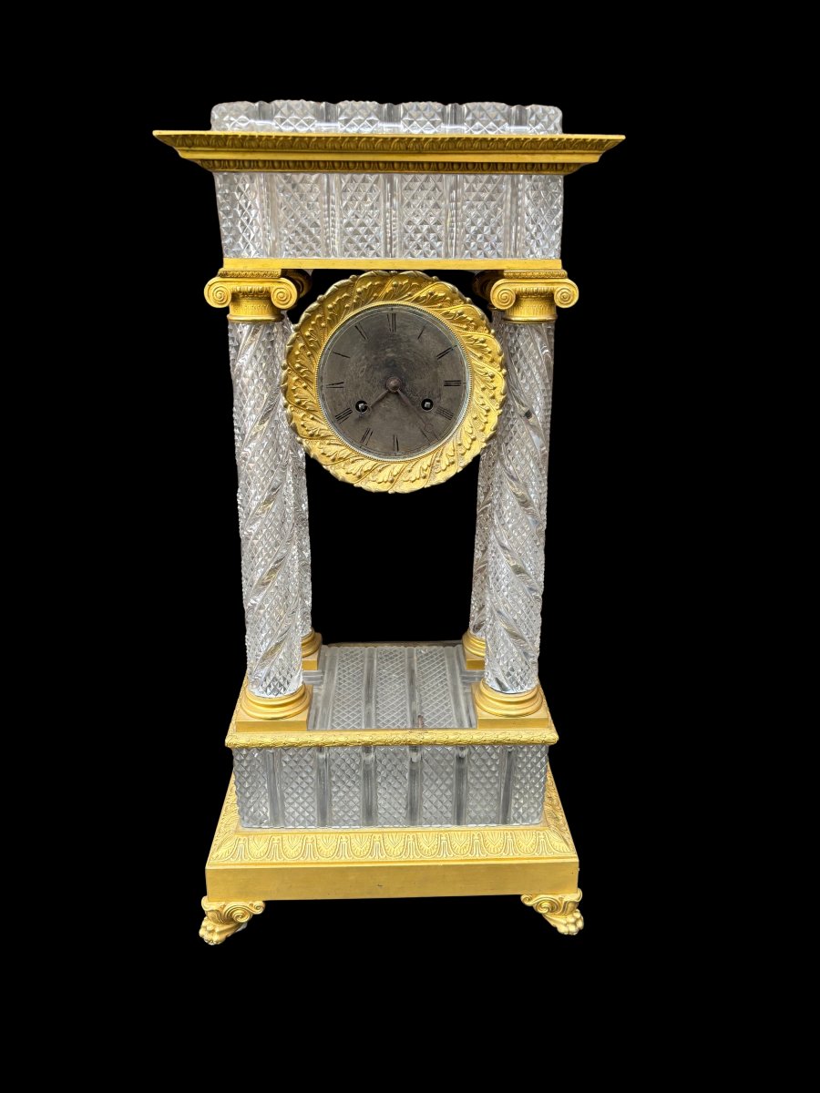 Orologio in bronzo dorato e cristallo 